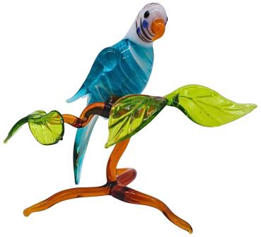 kleiner Wellensittich auf Ast, stehend (türkis)