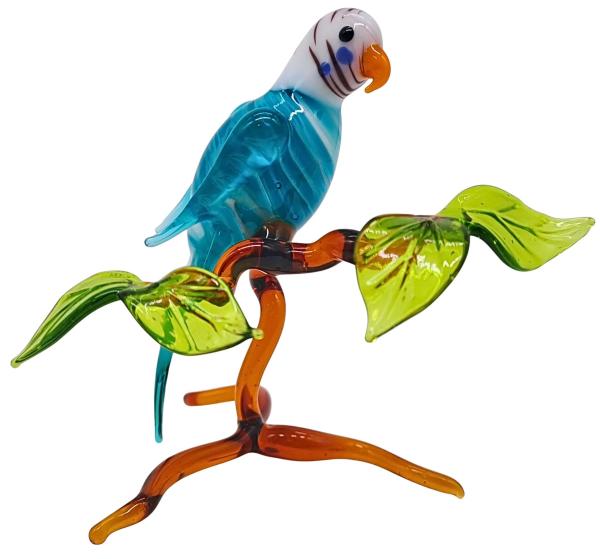 kleiner Wellensittich auf Ast, stehend (türkis)